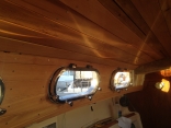 Lining The Cabin Sids And Roof With Cedar
