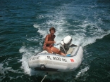 cleaning the dinghy while sailing