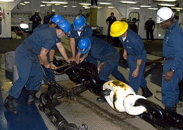 Click image for larger version

Name:	US_Navy_051015-N-1189B-064_Deck_Department_personnel_attach_a_pelican_hook_to_the_port_anchor_ch.jpg
Views:	1055
Size:	434.4 KB
ID:	105367