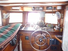 Click image for larger version

Name:	Swedish Cutter 55 Wood Pilot House interior.jpg
Views:	194
Size:	42.7 KB
ID:	143175