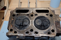 Click image for larger version

Name:	August 11, 2018. Cylinder Head when first removed. Notice the difference in carbon deposits.  .jpg
Views:	244
Size:	417.7 KB
ID:	175850