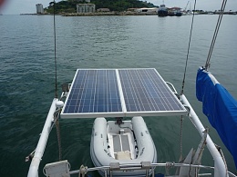 Click image for larger version

Name:	2 solar  panels mounted on stern                               with dinghy below.JPG
Views:	311
Size:	216.7 KB
ID:	180159