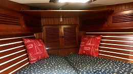 Click image for larger version

Name:	V berth with pillows and storage above.jpg
Views:	253
Size:	231.6 KB
ID:	189943