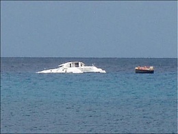 Click image for larger version

Name:	Catamaran calamity but she is still floating.jpg
Views:	809
Size:	13.4 KB
ID:	56935