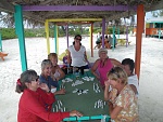 Playing Dominoes at the Sand Bar, Stocking Island