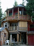 Homestead house built from lumber milled with a chain saw and rocks harvested from the land in North Idaho