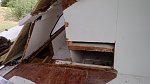 destruction of cabin wall & bunk flooring