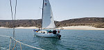 Motor/sailing along in the morning heading south in Becher's Bay on Santa Rosa island. When the wind comes up in the afternoon it blows off the beach...