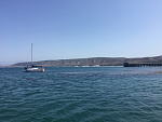 Pier at Becher's Bay on Santa Rosa island looking south. Torrey pines are on ridge directly behind the Cheoy Lee Luders 30 sailboat.