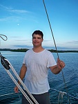 Me with moon over shoulder. I had just gotten rained on. :)