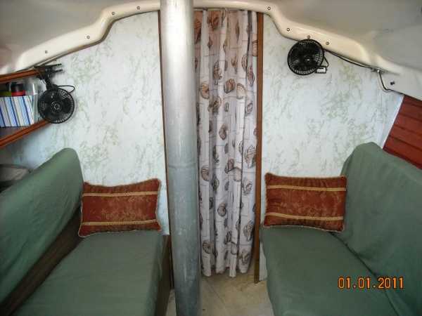 Of course, they were teak panel bulkheads before we got a hold to them.