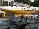 Fitting the main.  Mizzen is next to the boat. Mast is 80 ft and weighs about 2000 # fitted out.