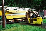 The street we were on was too narrow for the truck to turn into the driveway at the shop, so a forklift was used to lift the amas off in turn...